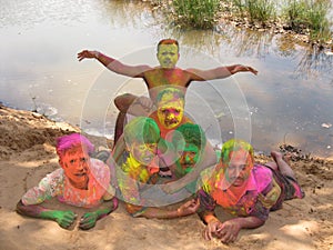 Indian Odisha`s men playing holi fastival in happy mood