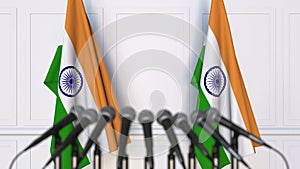 Indian official press conference. Flags of India and microphones. Conceptual 3D rendering