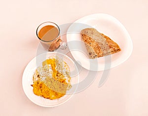 Indian  and Pakistani home made breakfast cuisine food traditional morning nashta dish fried egg anda paratha and tea photo photo