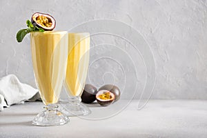 Indian Passion Fruit Lassi on gray background