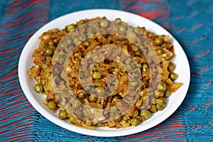 Indian patta gobhi-muttar Sabji