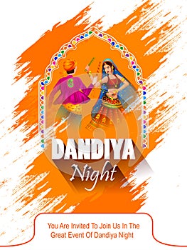 Indian people dancing Garba dance for Dandiya Disco Night event on Navratri Dussehra festival of India