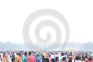 Indian people playing holi with colors and gulal in a ground