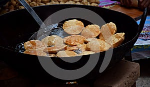 Indian Poori making in progress