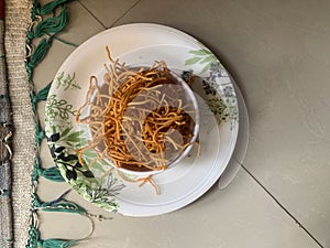 Indian popular snacks called Bhujia Sev or shev in bowl.