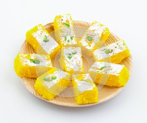 Indian Popular Sweet Food Khopara Pak or Coconut Burfi on White Background