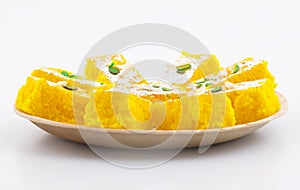 Indian Popular Sweet Food Khopara Pak or Coconut Burfi on White Background