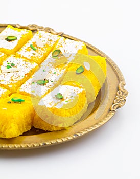 Indian Popular Sweet Food Khopara Pak or Coconut Burfi on White Background