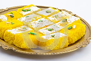 Indian Popular Sweet Food Khopara Pak or Coconut Burfi on White Background