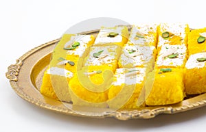 Indian Popular Sweet Food Khopara Pak or Coconut Burfi on White Background