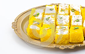 Indian Popular Sweet Food Khopara Pak or Coconut Burfi on White Background