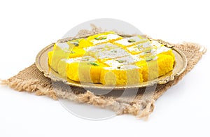 Indian Popular Sweet Food Khopara Pak or Coconut Burfi on White Background