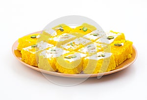 Indian Popular Sweet Food Khopara Pak or Coconut Burfi on White Background