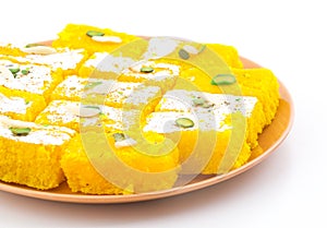 Indian Popular Sweet Food Khopara Pak or Coconut Burfi on White Background