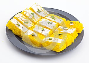 Indian Popular Sweet Food Khopara Pak or Coconut Burfi on White Background