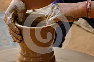 Indian potter hands at work, Shilpagram, Udaipur, Rajasthan, India