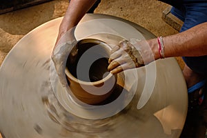 Indian potter hands at work, Shilpagram, Udaipur, Rajasthan, India