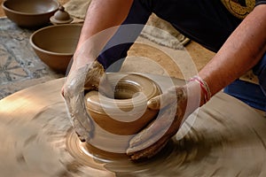 Indian potter hands at work, Shilpagram, Udaipur, Rajasthan, India