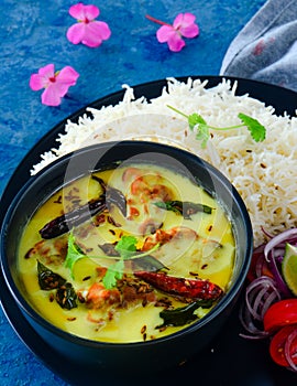 Indian Punjabi glutenfree meal- dahi ki kadhi and rice photo
