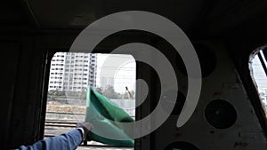 Indian Railway: green flag to show all clear.