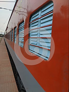 Indian railways IRCTC red colour train in lockdown shut down tracks trains rail transportation transport travel