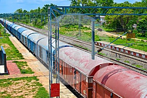 Indian Railways Station With Train, Platform, Overbridge & Nature. 05.