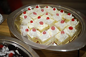 Indian reception wedding cake with roses and donuts.Beautiful wedding cake in Romantic styles