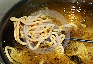 Indian Recipe Murukku frying photo