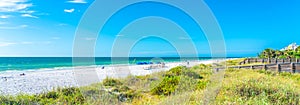 Indian rocks beach with green grass in Florida, USA