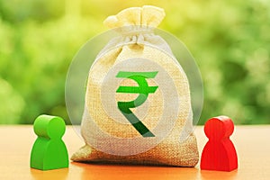 Indian rupee money bag and two businessmen. Business investment, lending, leasing. Dispute solution between . Division of property