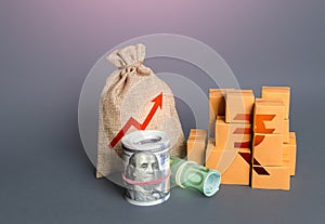 Indian rupee symbol with goods and an arrow up. Growing profits. High sales. Import export. Increase in budget revenues.