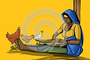 Indian rural woman is cleaning the rice photo