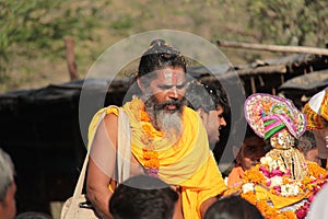 Indian Holy guru leads procession of faithful