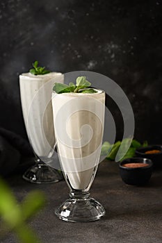 Indian Salty lassi with mint leaves and kala namak.