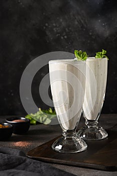 Indian Salty lassi with mint leaves and kala namak.