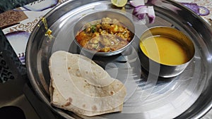 Indian served thali with dal, roti and sabji
