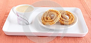 Indian Snack Chakli with Coffee photo