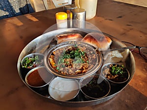 Indian snack misal beautifully served with pav bun