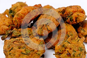 Indian snack pakora in white plate