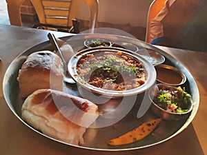 Indian snack pav bhaji beautifully served with pav bun