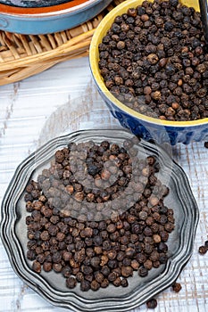 Indian spices collection, dried black peppercorns, kitchen spices