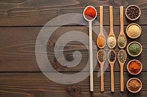 Indian spices and herbs on wooden table - Top view