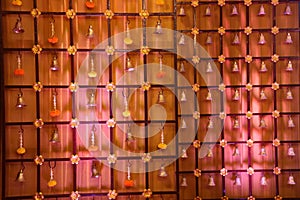 indian stage decoration with flowers and bells