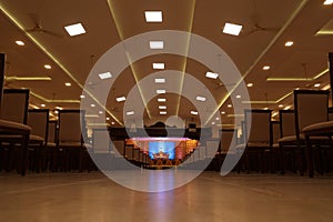 indian stage decoration with flowers and bells