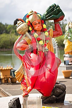 Indian statues on the background of the lake in Mauritius. Grand Bassin.