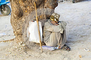 Indian street beggar seeking alms