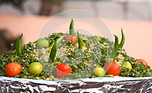 Indian street Food: Cooked rice with raw vegetables