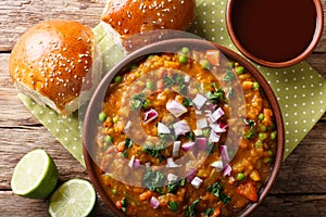 Indian street food Pav bhaji vegetables close-up in a bowl. horizontal top view