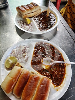 Indian street food pav bhaji in white plate