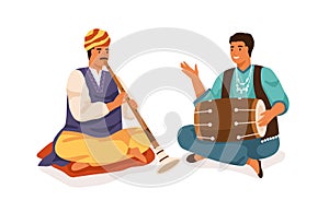 Indian street musicians playing shehnai and dholak drum. Happy men performing traditional folk music on national photo